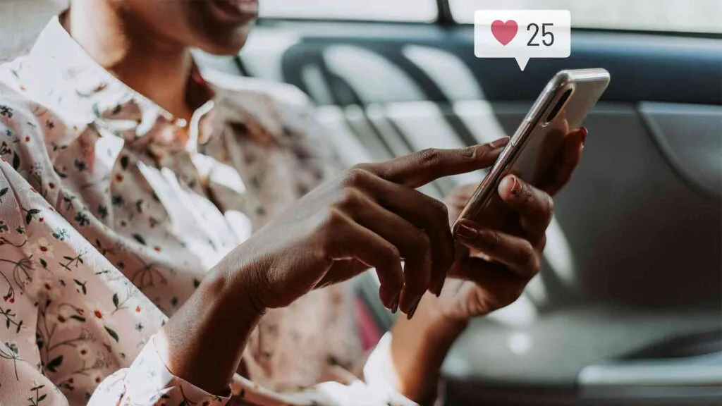 woman-using-social-media-her-smartphone-while-car