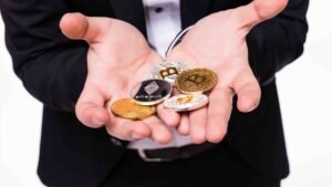 man-holds-different-crypto-coins-his-hands-white