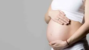 pregnant-woman-touching-her-belly