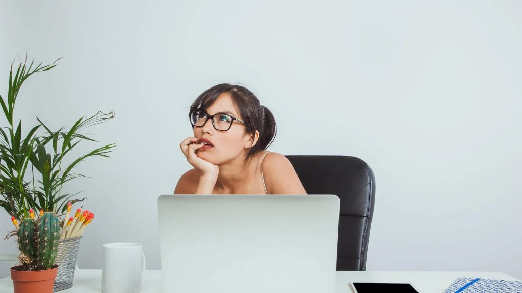 young-businesswoman-thinking-working