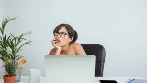 young-businesswoman-thinking-working