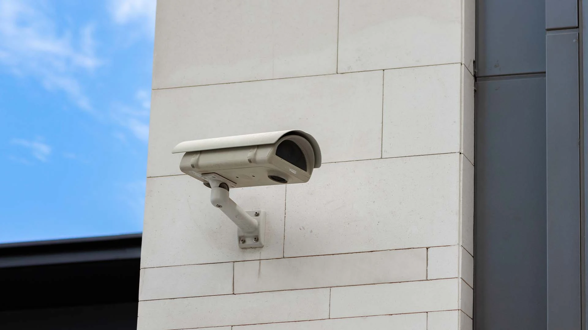 surveillance-camera-built-into-stone-wall-building