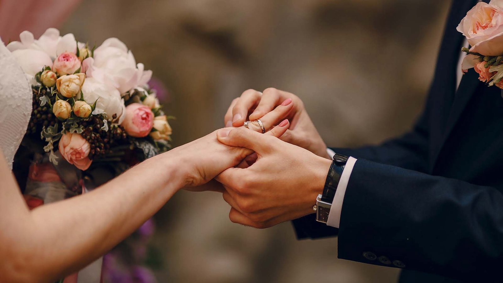 groom-putting-ring-bride-s-finger