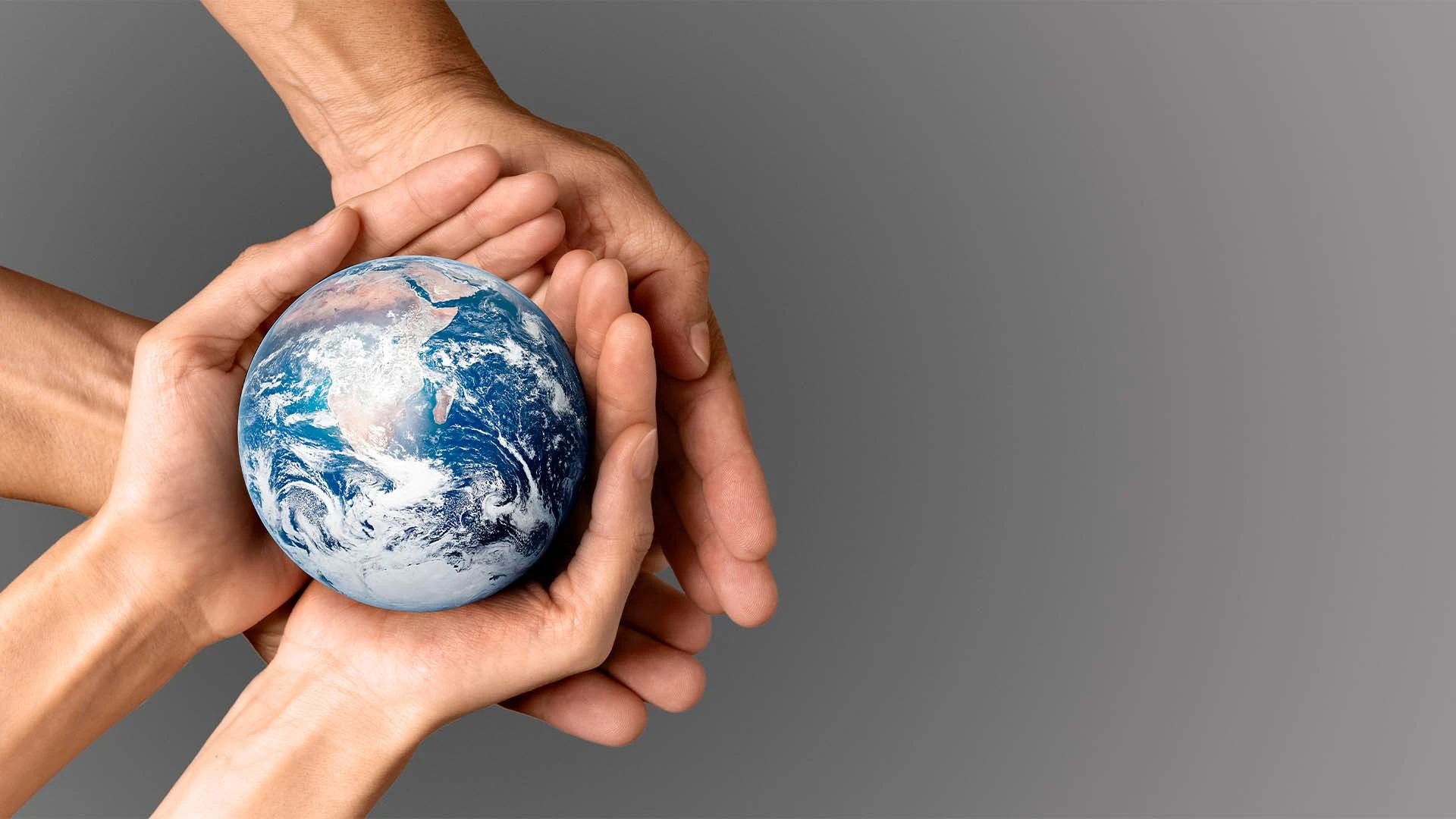 people-holding-earth-their-hands