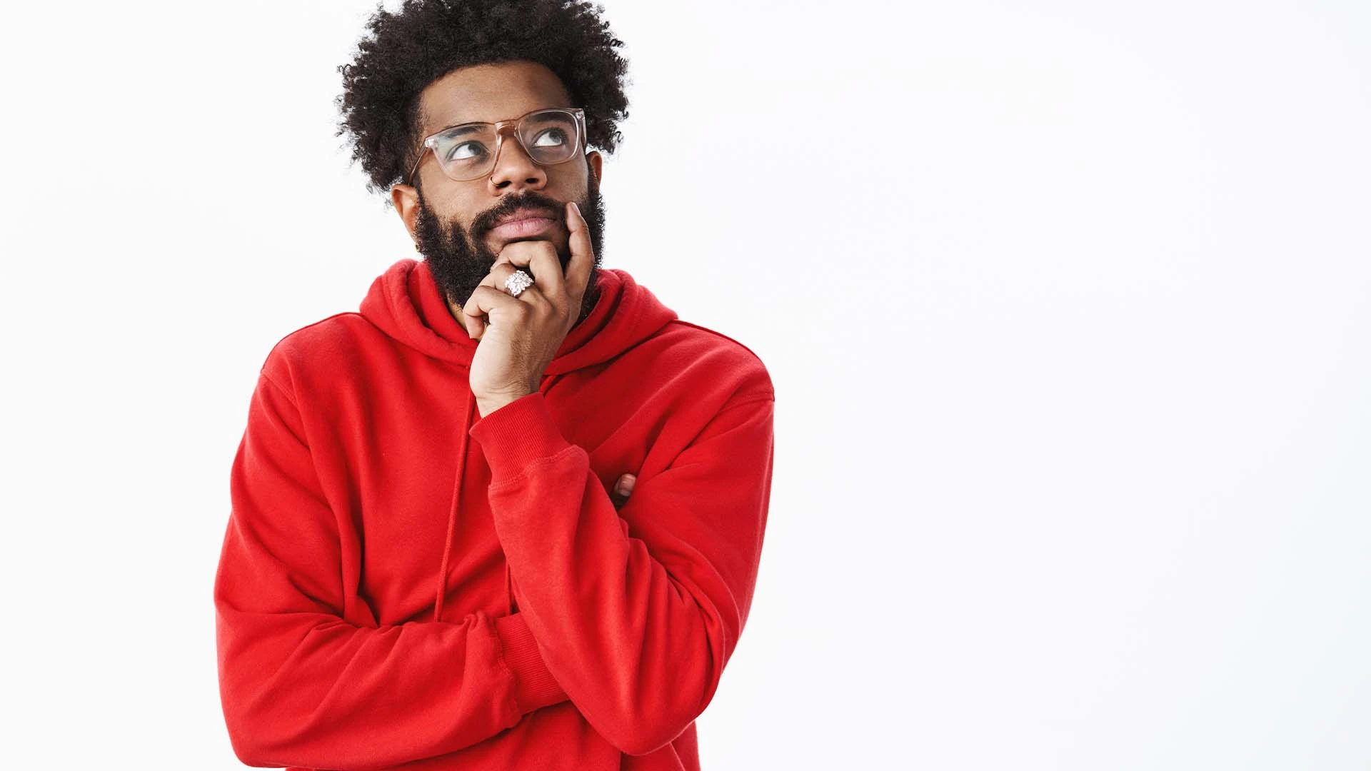 creative-african-american-bearded-guy-with-afro-hairstyle-glasses-red-hoodie-creating-new-song-stand